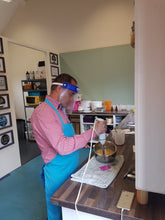 Student mixing soap